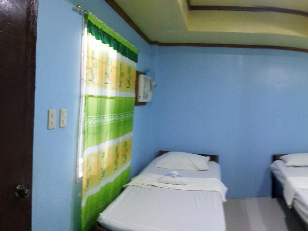 Dhayne Pension Puerto Princesa Szoba fotó